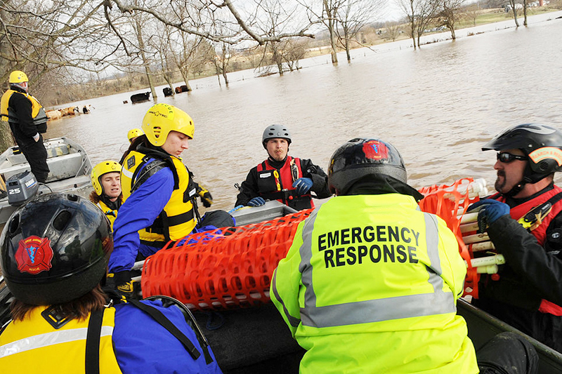 An image of emergency responders preparing to go out onto the lake.
