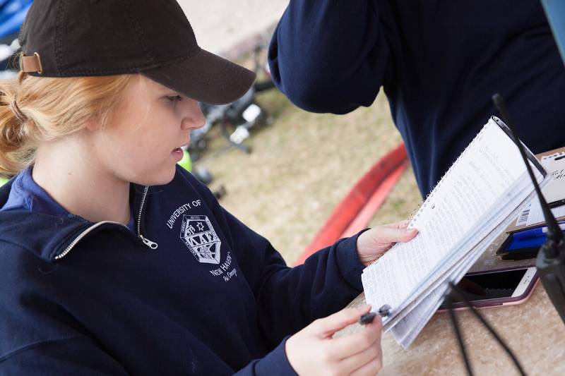 Photo of an emergency technician reading through her notes.