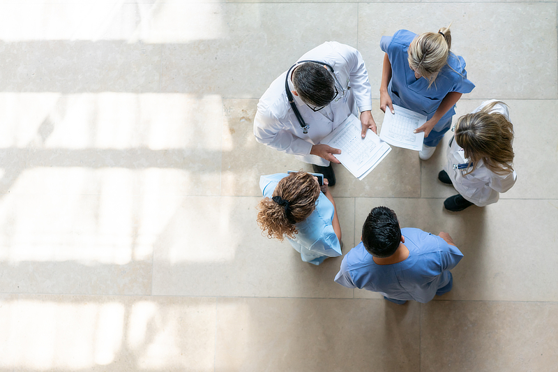 A group of medical workers having a discussion.